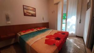Posteľ alebo postele v izbe v ubytovaní Hotel Amalfi