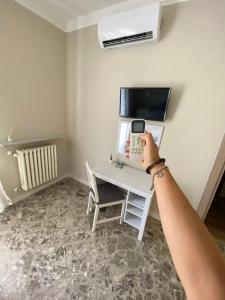 TV a/nebo společenská místnost v ubytování B&B Amores