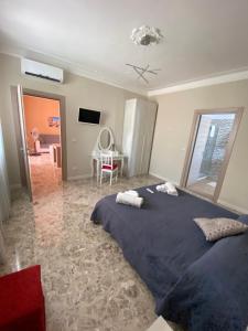 Postel nebo postele na pokoji v ubytování B&B Amores