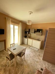 Kuchyň nebo kuchyňský kout v ubytování B&B Amores