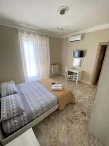 Postel nebo postele na pokoji v ubytování B&B Amores