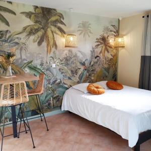 Кровать или кровати в номере Gites et Spa - Manoir des Falaises