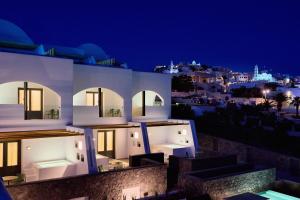 a view of a house at night at Alleys All-Suite Hotel & Spa in Pirgos