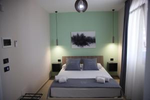 Posteľ alebo postele v izbe v ubytovaní Valenti rooms & relax + 37 fotografií