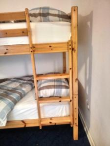 a set of bunk beds in a room at Beti Blu, Kaninska vas in Bovec
