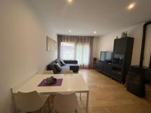 Posezení v ubytování Precioso apartamento con vistas montaña o rio