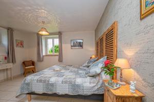Postel nebo postele na pokoji v ubytování manoir de vauville