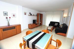 Posedenie v ubytovaní Apartamento Plaça Jardí