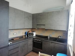 Nhà bếp/bếp nhỏ tại TERRAZZA SUL MARE IN VIA DEVOTO
