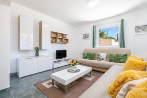 TV a/nebo společenská místnost v ubytování Apartments Villa Maja