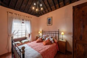Posteľ alebo postele v izbe v ubytovaní CASA LOS TAJINASTES