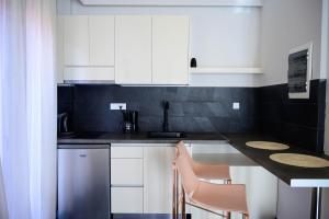 Kuchyňa alebo kuchynka v ubytovaní Luxury Suites by Panagiota