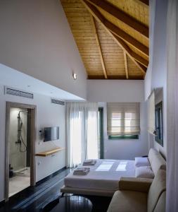 Posteľ alebo postele v izbe v ubytovaní Luxury Suites by Panagiota