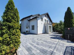 an image of a house with a driveway at GreenWood Residence in Timişoara
