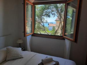 Posteľ alebo postele v izbe v ubytovaní Apartments in Zadar - Zadar Riviera 40411