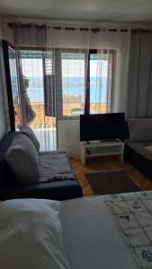 Posezení v ubytování Apartments Suco