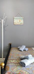 Postel nebo postele na pokoji v ubytování SeaSide Apartment Rio