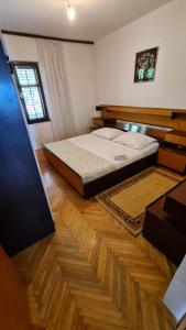 Postel nebo postele na pokoji v ubytování Apartments Suco