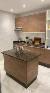 Nhà bếp/bếp nhỏ tại Rue Russie Appartement +8 ảnh