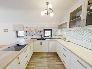 Kuchyňa alebo kuchynka v ubytovaní Malom és Kacsa Boutique Hotel