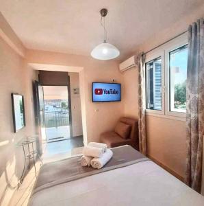 Postel nebo postele na pokoji v ubytování Lovely Rooms Finikounda