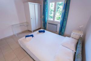 Postel nebo postele na pokoji v ubytování Mali Losinj Apartment 8