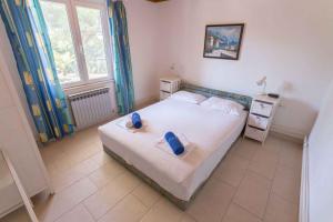 Ένα ή περισσότερα κρεβάτια σε δωμάτιο στο Mali Losinj Apartment 8