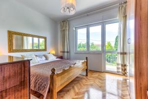 Posteľ alebo postele v izbe v ubytovaní Regent Apartment in Kastela
