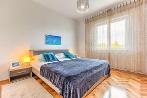 Posteľ alebo postele v izbe v ubytovaní Regent Apartment in Kastela
