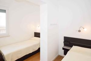 Postel nebo postele na pokoji v ubytování Apartment Pula 45
