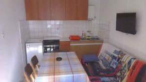 Kuchyň nebo kuchyňský kout v ubytování Apartment in Starigrad-Paklenica 6806 + 18 fotografií