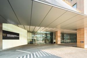 an external view of a building at The Royal Park Hotel Iconic Tokyo Shiodome in Tokyo