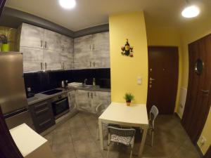 Posedenie v ubytovaní Apartament Osiedle Garnizon