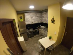 Posedenie v ubytovaní Apartament Osiedle Garnizon