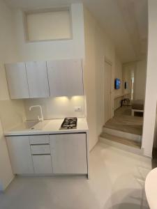 Η κουζίνα ή μικρή κουζίνα στο HOME 3 BED Aparthotel +56 φωτογραφίες