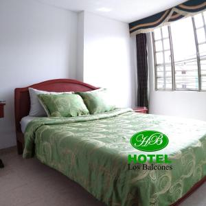 Postel nebo postele na pokoji v ubytování HOTEL LOS BALCONES