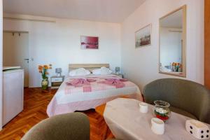 Posteľ alebo postele v izbe v ubytovaní Studio Crikvenica 6