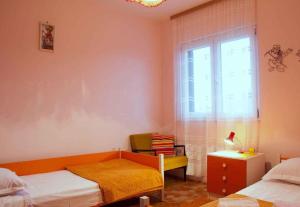 Postel nebo postele na pokoji v ubytování Apartment in Pucisca - Insel Brac 5972