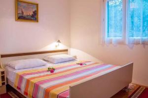 Postel nebo postele na pokoji v ubytování Apartment in Pucisca - Insel Brac 5972
