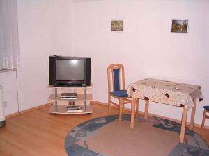 Μια τηλεόραση ή/και κέντρο ψυχαγωγίας στο Apartment in Küstriner Vorland 2607