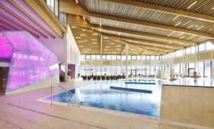 a large swimming pool in a large building at Studio in Bad Aussee - Steiermark 428 in Bad Aussee