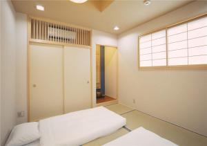 谷町君・星屋・城下の宿 객실 침대