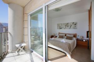 Postel nebo postele na pokoji v ubytování Apartamento Paradero de Ifach - Costa CarpeDiem