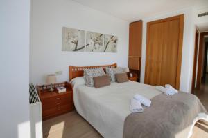 Postel nebo postele na pokoji v ubytování Apartamento Paradero de Ifach - Costa CarpeDiem