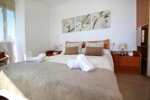 Postel nebo postele na pokoji v ubytování Apartamento Paradero de Ifach - Costa CarpeDiem