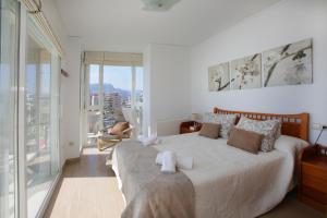 Postel nebo postele na pokoji v ubytování Apartamento Paradero de Ifach - Costa CarpeDiem