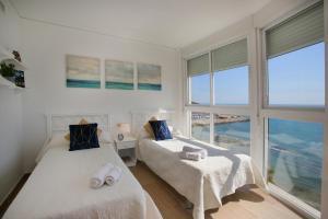 Postel nebo postele na pokoji v ubytování Apartamento Paradero de Ifach - Costa CarpeDiem