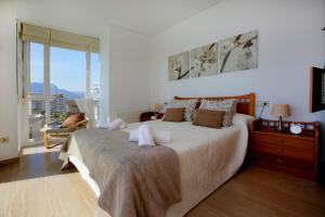 Postel nebo postele na pokoji v ubytování Apartamento Paradero de Ifach - Costa CarpeDiem