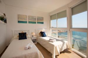 Postel nebo postele na pokoji v ubytování Apartamento Paradero de Ifach - Costa CarpeDiem