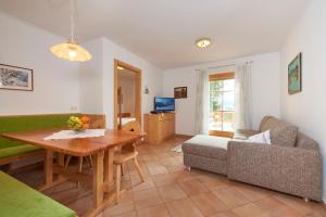 TV a/nebo společenská místnost v ubytování Appartement Hotel Sonneck